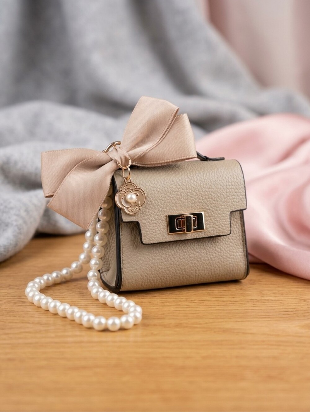 Elegant Taupe Mini Crossbody with Bow & Pearl Strap